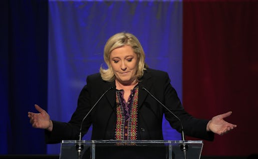 Far Right National Front party leader Marine Le Pen delivers her speech after the results of the second round of the regional elections in Henin-Beaumont, northern France, Sunday Dec.13, 2015. Marine Le Pen's far-right National Front collapsed in French regional elections Sunday after dominating the first round of voting, according to pollsters' projections. (AP Photo/Thibault Camus)