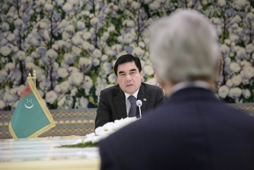 Turkmenistan President Gurbanguly Berdimuhamedov background talks, during a meeting with US Secretary of State John Kerry, at the Oguzkhan Presidential Palace in Ashgabat, Turkmenistan, Tuesday, Nov. 3, 2015. U.S. Secretary of State John Kerry ventured Tuesday to a place few world leaders and even fewer journalists or human rights monitors ever see, dangling the opportunity of greater U.S. investment, expanded security cooperation and a strategic counterweight to nearby Russia and China if the government improves its human rights record. (Brendan Smialowski/Pool Photo via AP)
