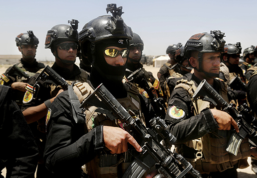 Irakiska elittrupper samlas inför anfallet mot al-Falluja. Foto: AP/Khalid Mohammed