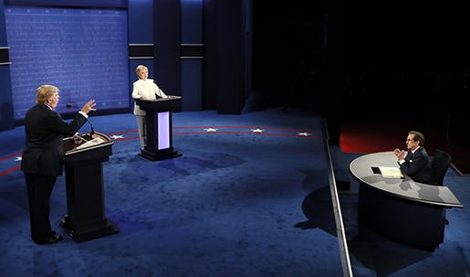 Moderator Chris Wallace, of FOX News, questions Democratic presidential nominee Hillary Clinton and Republican presidential nominee Donald Trump during the third presidential debate at UNLV in Las Vegas, Wednesday, Oct. 19, 2016. (Mark Ralston/Pool via AP)