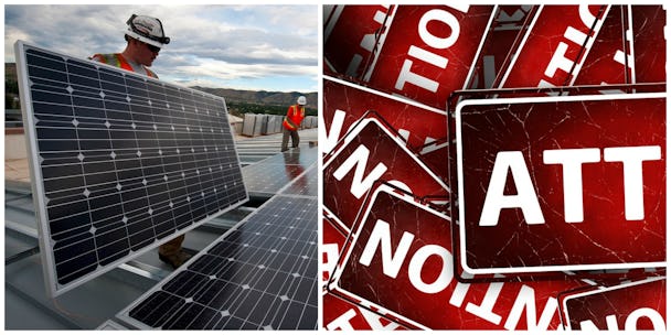 Personer arbetar med solpaneler på tak, monterat invid en samling varningsskyltar