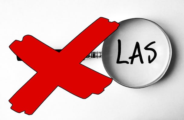 Ett förstoringsglas riktat mot ordet LAS, med ett rött kryss över.