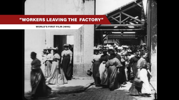 En svartvit bild på arbetare, från en gammal film