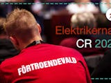 En person i röd tröja med texten "Förtroendevald" på ryggen. Monterat över är texten: Elektrikernas CR 2021.